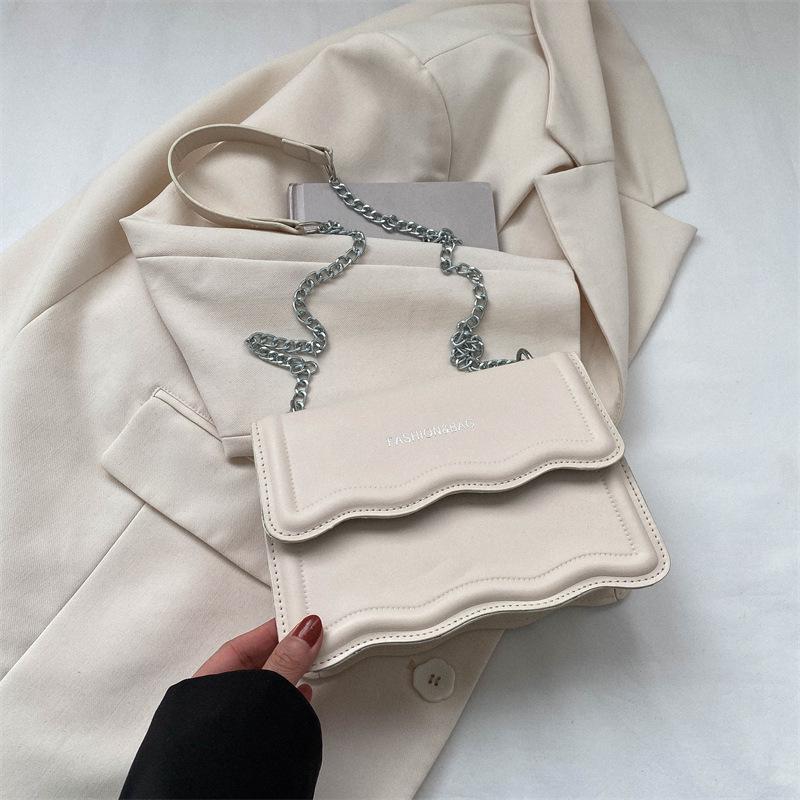 Korean Style Small Square Women's Crossbody Bag - 2025 Solid Color, Wave Pattern, Chain Shoulder, Simple Fashion.
