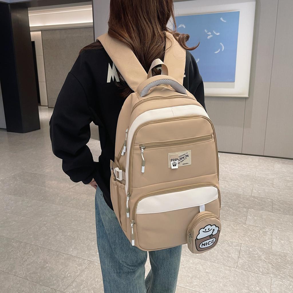 Simple and cute girl burden reduction backpack large size student schoolbag primary and secondary school students large capacity backpack