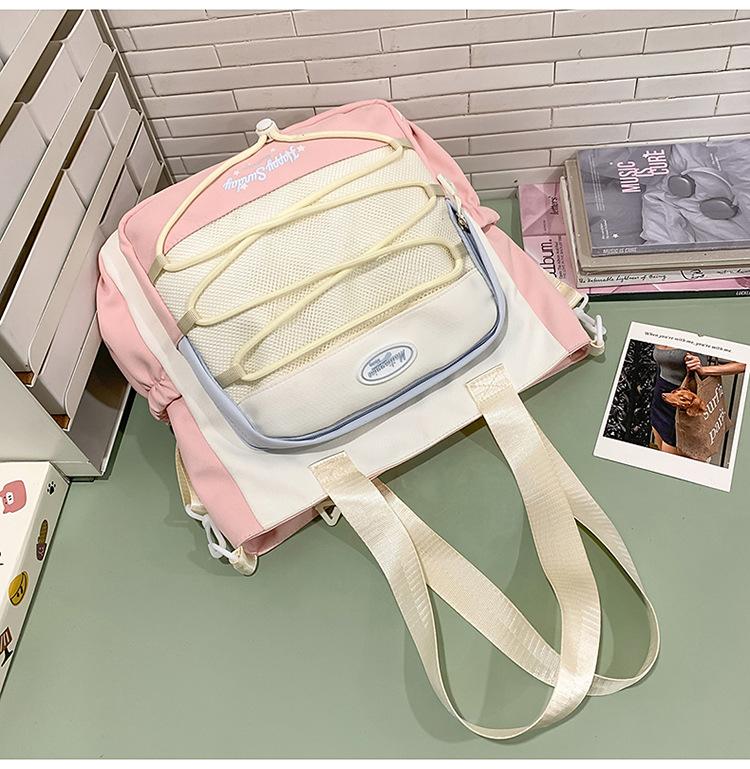High-value cute primary school student spine care schoolbag female junior high school girl high school student backpack burden reduction
