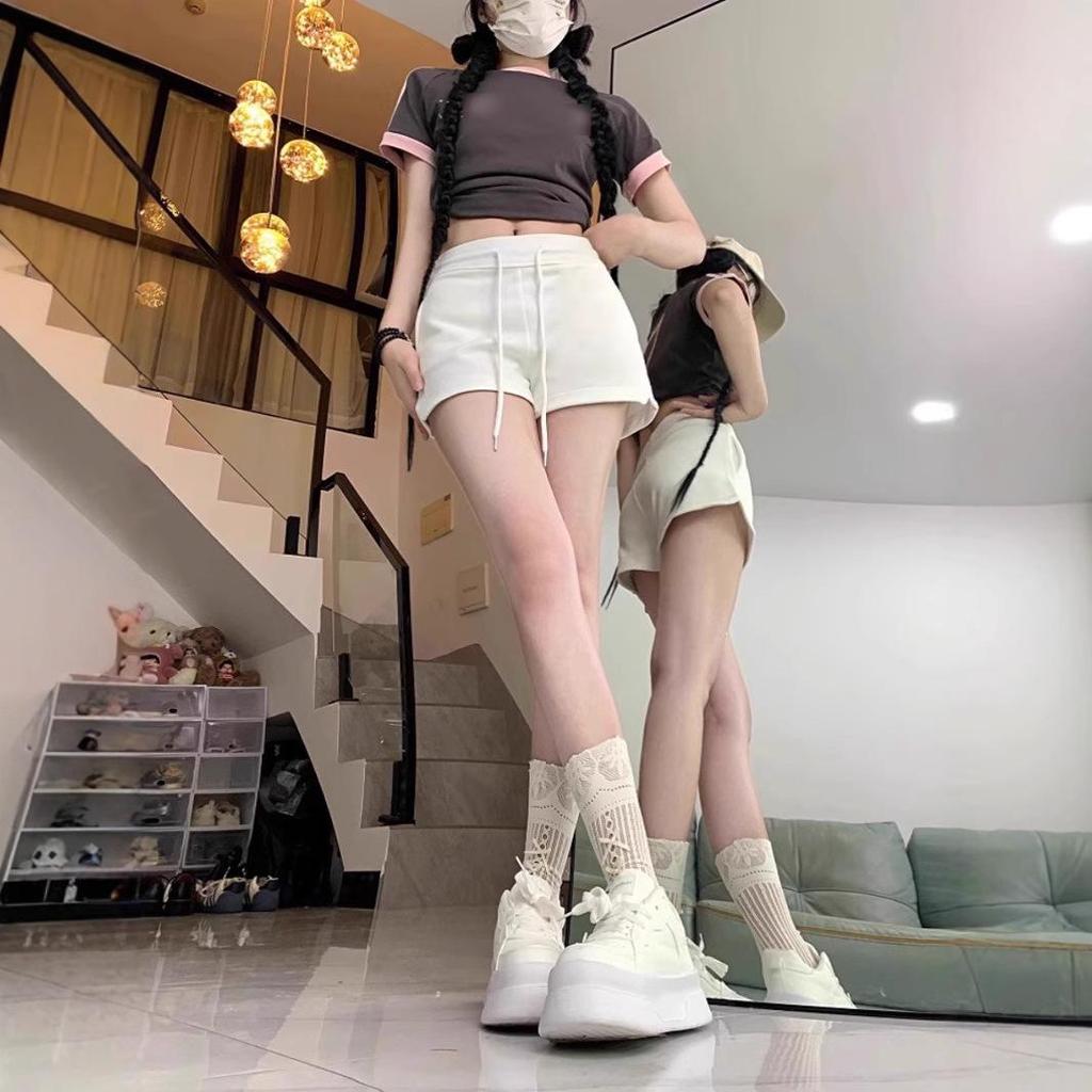 Women's Spicy Girl Black Drawstring Casual Shorts: Autumn Elastic Waist, Slit Straight Leg, Solid Color Fashion.