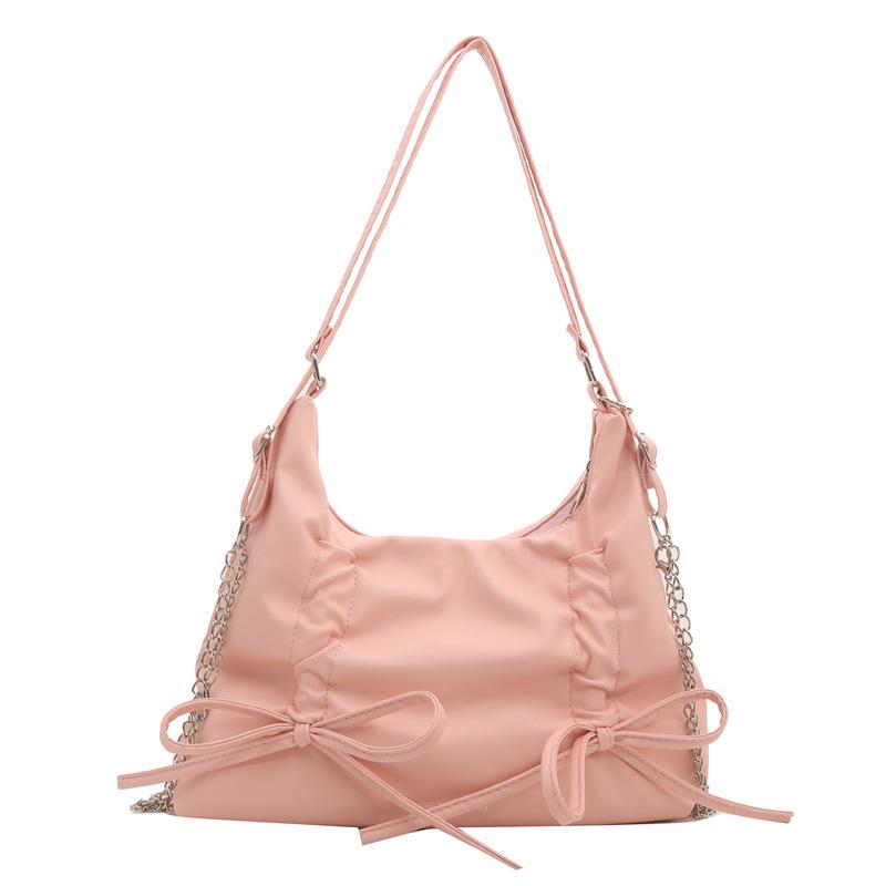 

Pleated bow large capacity backpack women s 2024 spring new fashion commuter tote bag texture shoulder bag рожевий
