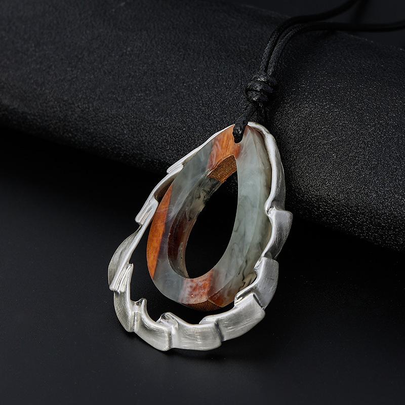 New women's necklace long high fashion retro personality trend pendant European and American