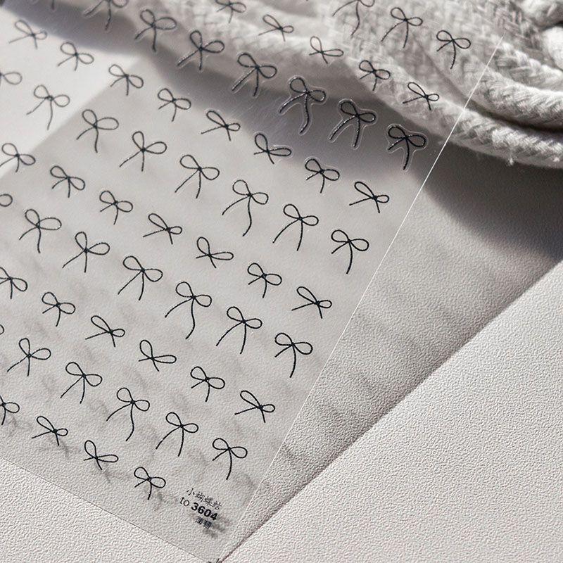 

Small Bowknot Nail Art Sticker Tomoni Thin Tough Adhesive Best Selling Cute Nail Sticker Japanese Style Nail Beauty Ornament Black Little Bows 3604