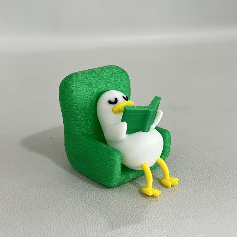 Multi-scene Lazy Reading Duck Figurine 3D Printed Cute Ornament for Car Dashboard Home Desk Bookshelf Decor Funny Small Gift