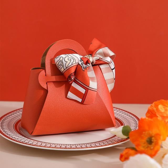 10 pezzi distribuiscono sacchetti regalo in pelle rosa, bomboniere per ospiti, mini borsetta con nastro, scatola per imballaggio di caramelle, decorazioni per feste
