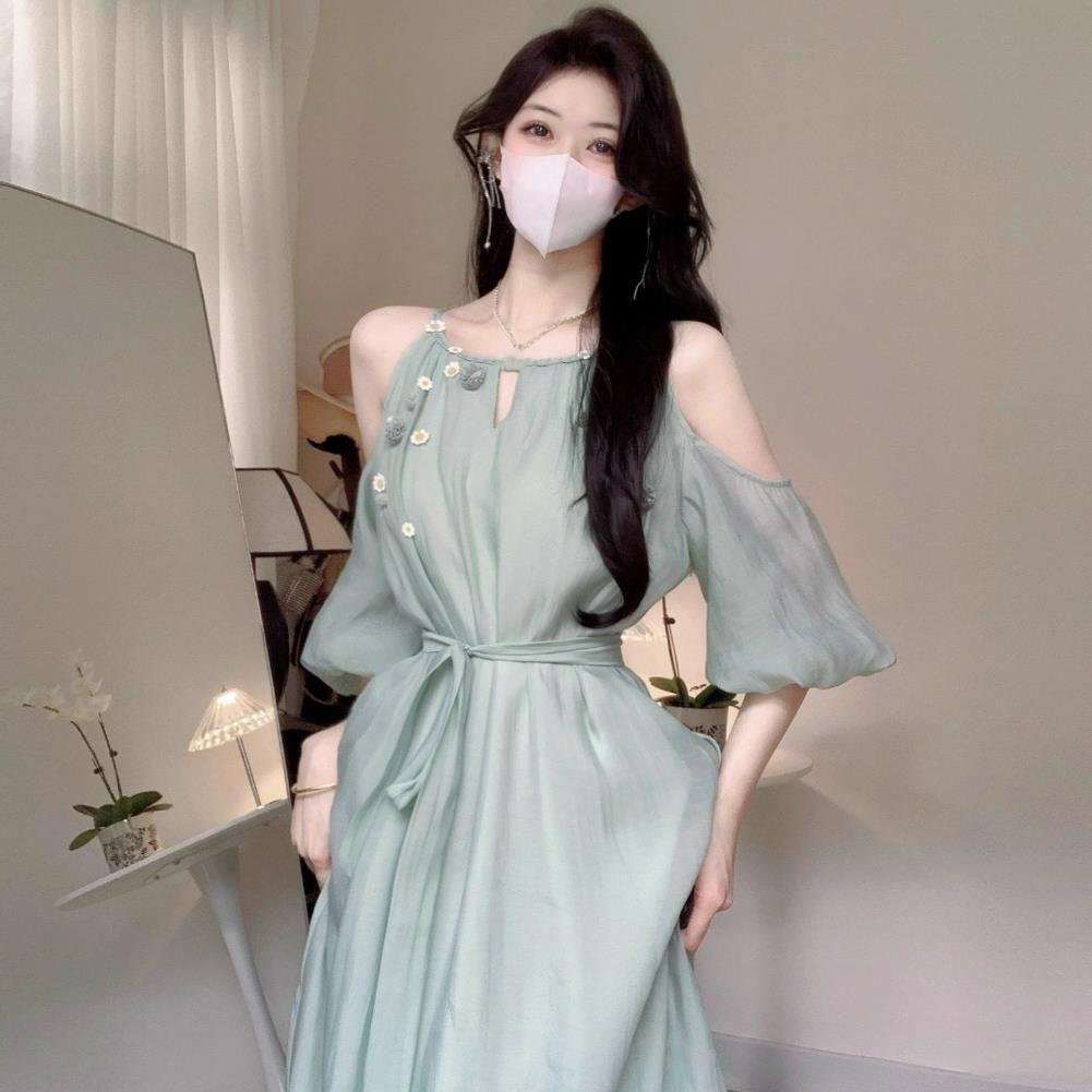 French cold feeling small daisy off-the-shoulder suspender dress women's summer new temperament socialite style loose medium and long dress