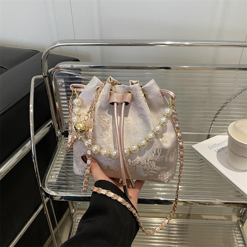 Premium texture spring new shopping pearl versatile cute bucket bag women's trend messenger bag