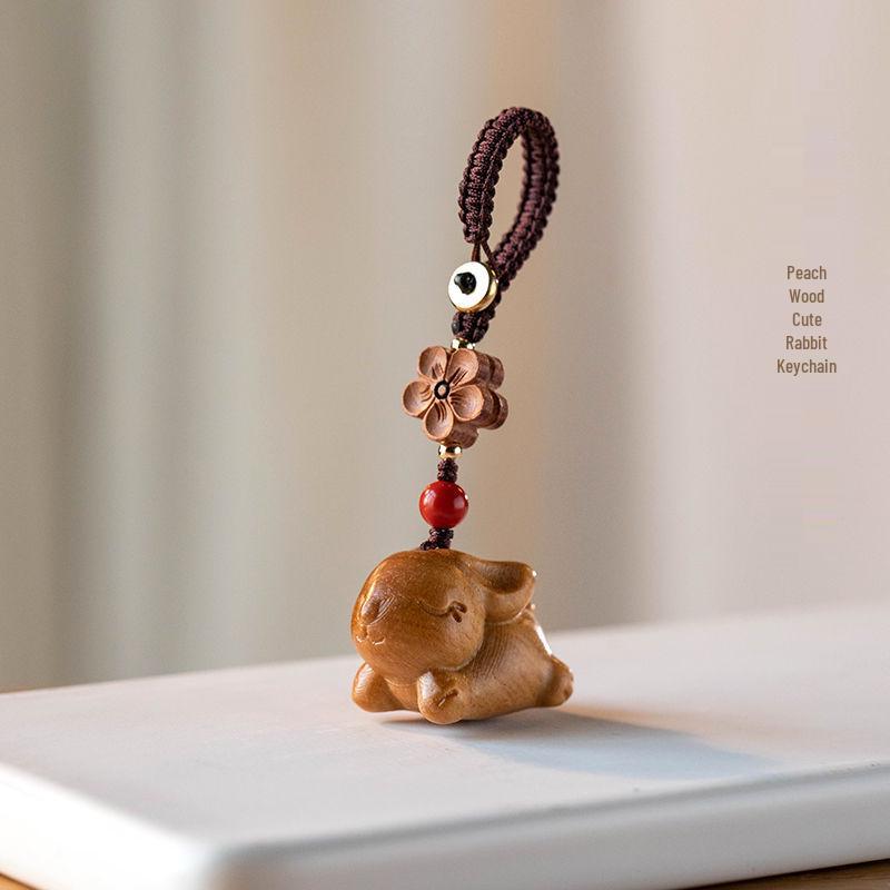 

Sandalwood Zodiac Rabbit Keychain Pendant - Peach Wood Ornament for Men & Women, Mobile Phone Accessory, Benming Year Gift