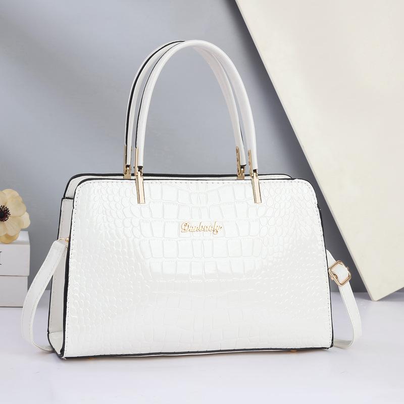 

Новая мода большой емкости яркие кожаные женские сумки универсальная сумка через плечо дизайнерская сумка для покупок пригородных поездок