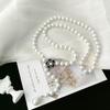 Elegant Adjustable Pearl Necklace - Versatile Light Luxury Jewelry for Women, Perfect for Autumn and Winter Sweaters.