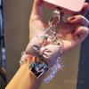 Small fragrance bow tie, love mobile phone hanging chain, ins mobile phone case, pendant, beaded chain, short fashion women's wrist ornament