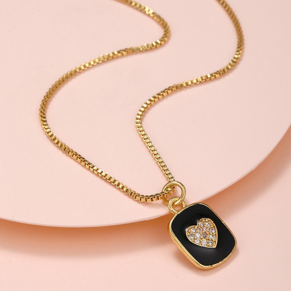 Valentine's Copper & Zircon Heart Pendant Necklace - Fashionable Women's Jewelry with Enamel Design and High-End Sweater Chain Style.