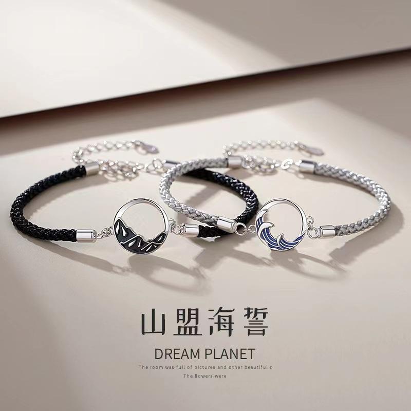 A stylish woven moon pendant bracelet, a couple's jewelry piece suitable for everyday wear by couples.