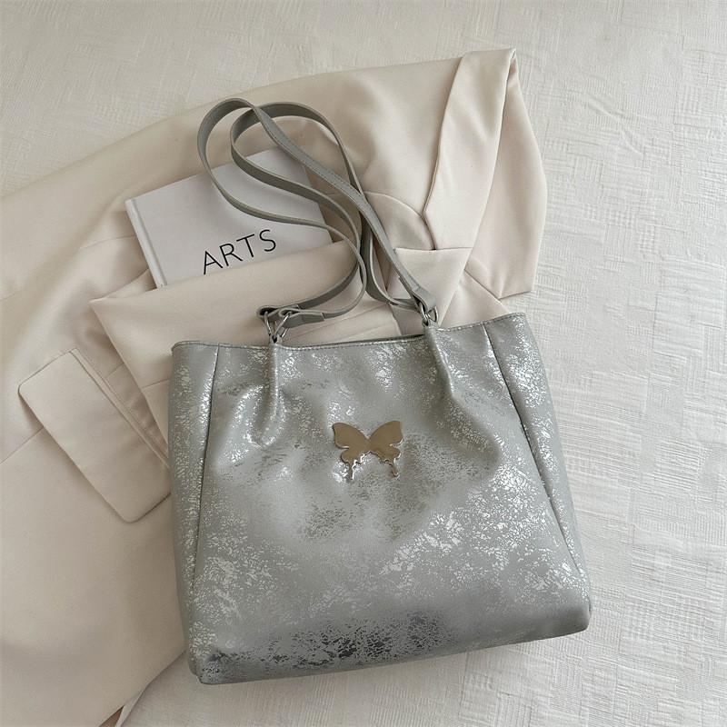 

Elegant And Cute Women s Large Capacity Tote Bag With Butterfly Design Perfect For Spring Summer Outfits In Various Shades срібний