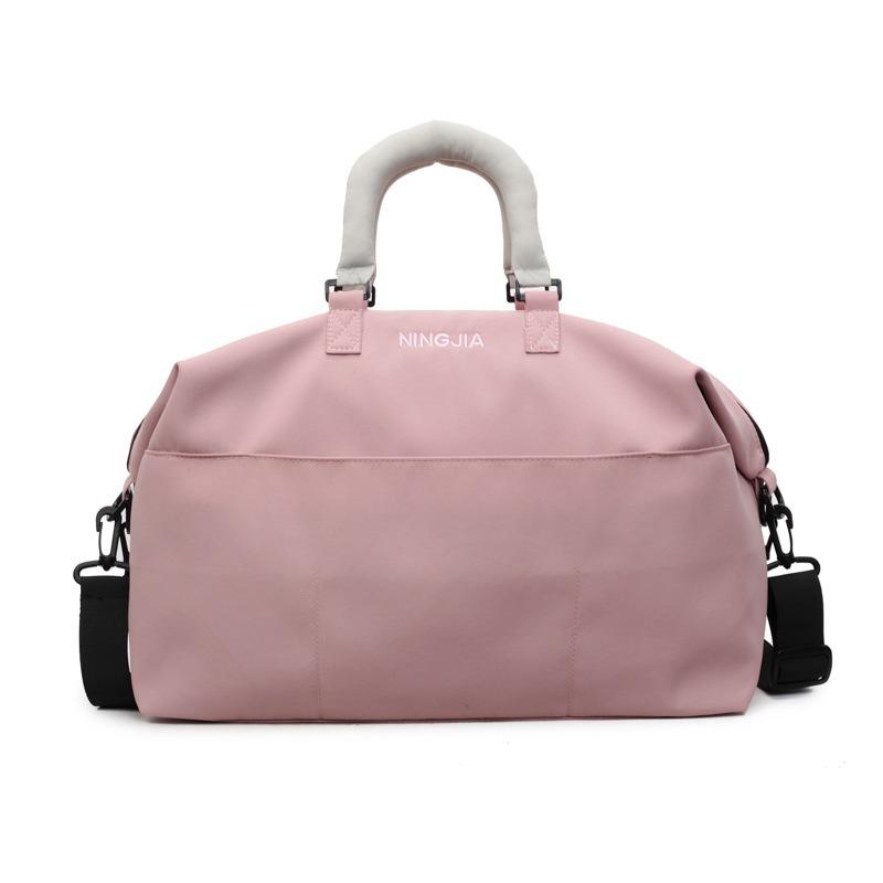 

Korean Style Large Capacity Travel Bag with Trolley Handle Attachment for Sports and Short Trips One Size рожевий
