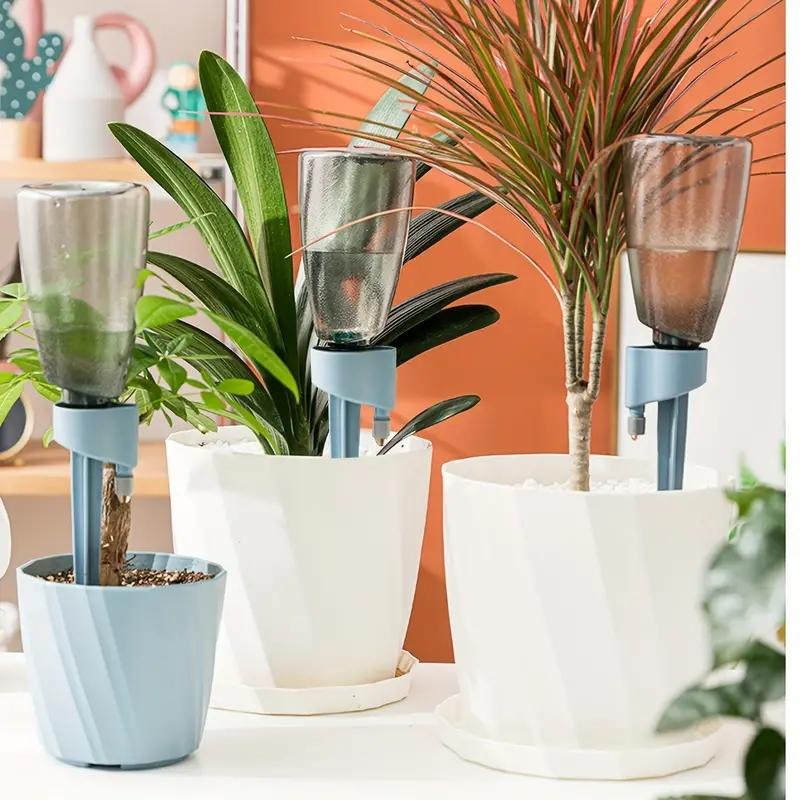 Watering artifact for business trips, automatic watering device for home drip irrigation, watering device for lazy people, potte