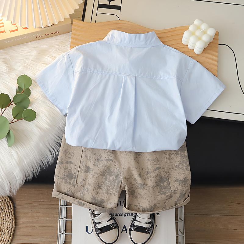 Boys' short sleeved two-piece set with cartoon printed shirt and casual shorts High-quality clothes for Boys