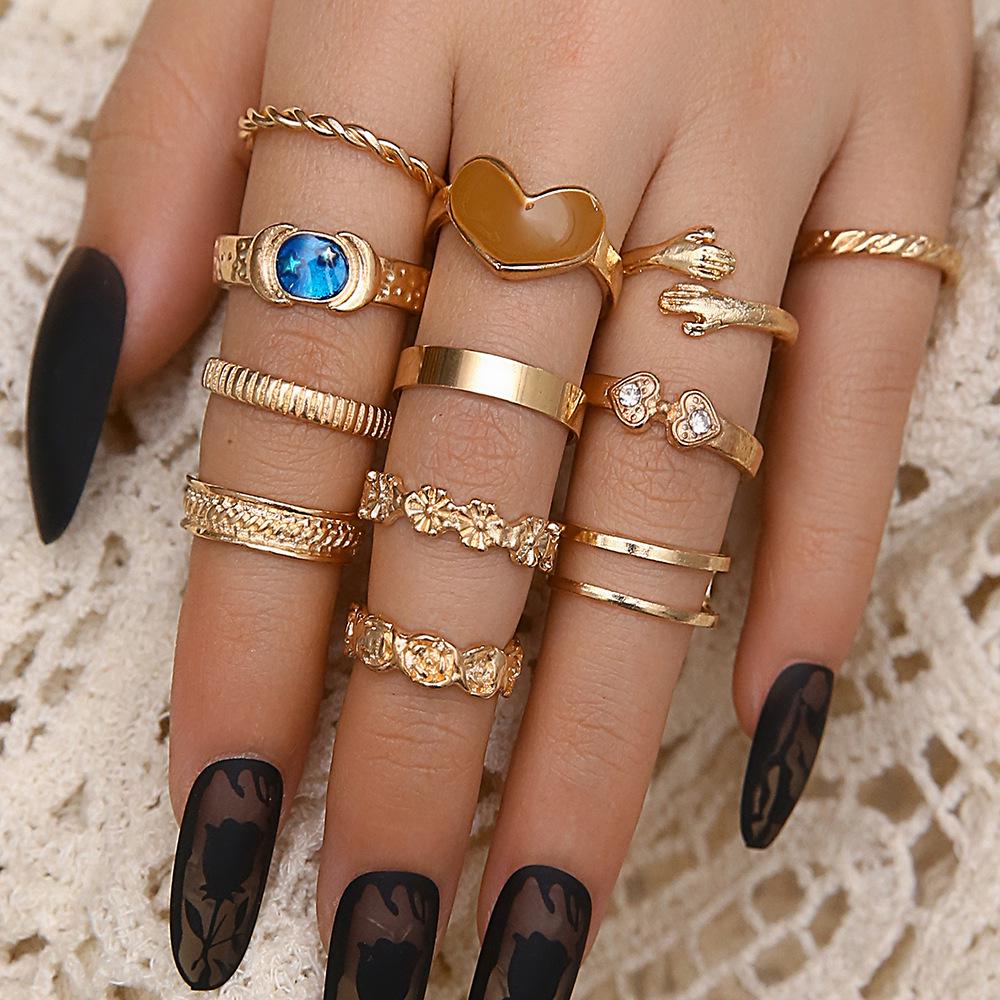 

Fashionable Heart-Shaped Rings Set: Twisted Design with Micro-Inlaid Diamonds, 12 Pieces