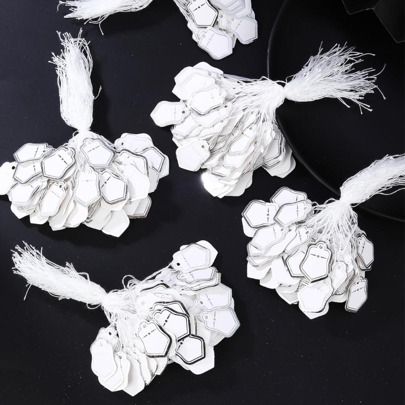 Förpackning med 500 st Guld/Silver Pappersstjärna Formade Prislappar Stadigt Papper Förstansade Hål För Detaljhandel Smyckesdisplay Festdekorationer