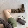 Women's 6CM Inner Height Retro Western Knee-High Cowboy Boots with Round Toe, Buckle Strap, and Soft Ruched Design.