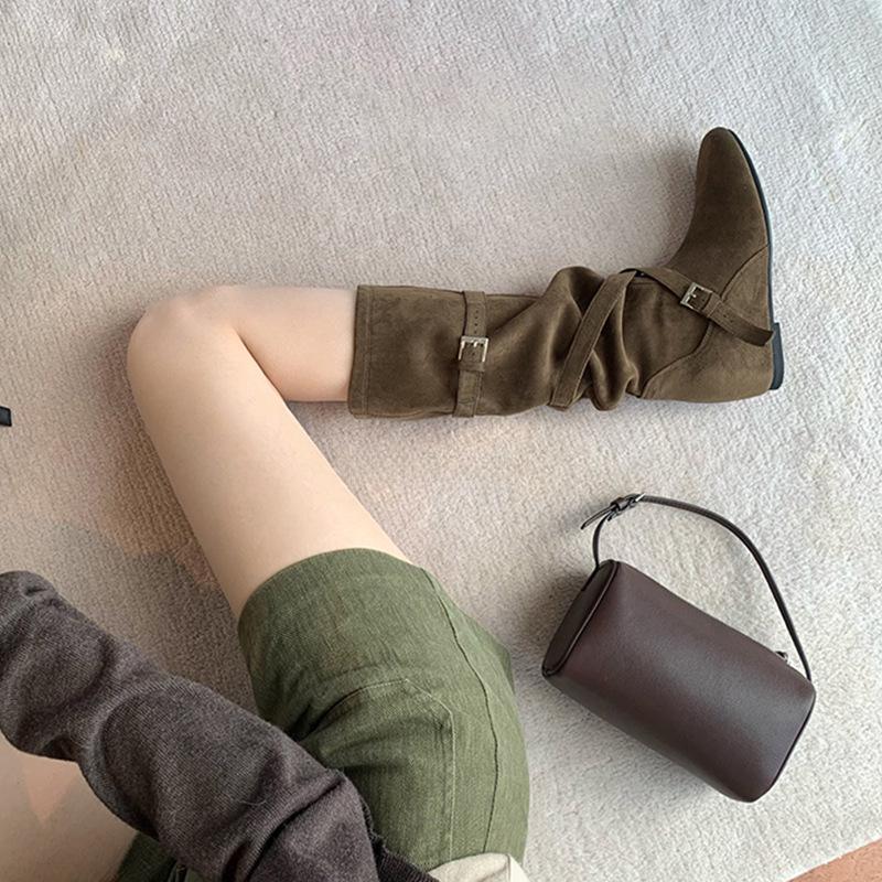 Women's 6CM Inner Height Retro Western Knee-High Cowboy Boots with Round Toe, Buckle Strap, and Soft Ruched Design.