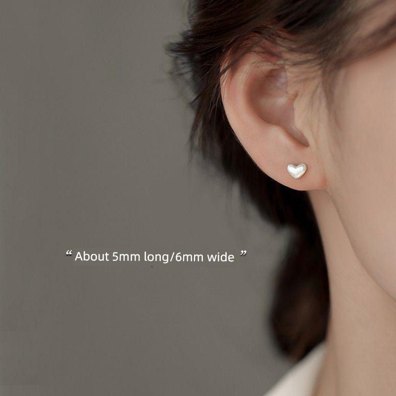 

Xiangnan Sterling Silver Brushed Niche Style 2024 New Female Stud Earrings 999 silver brushed Heart stud earrings (two price)