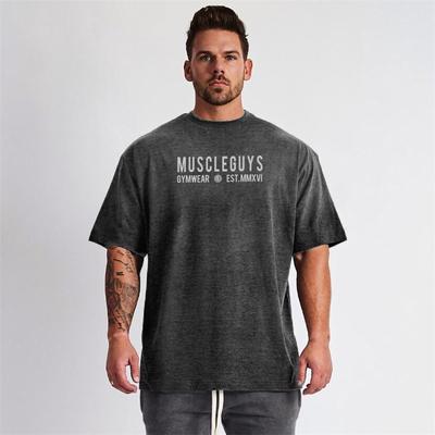 Túlméretezett póló Férfi leesett vállú, rövid ujjú fitnesz póló, bő edzőtermi felsők