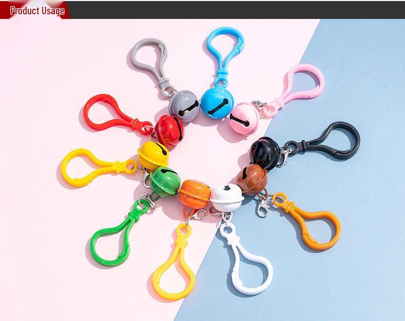 Bunter Plastikglocken-Schlüsselanhänger-Ornament - Niedliches und kreatives kleines Geschenkaccessoire.
