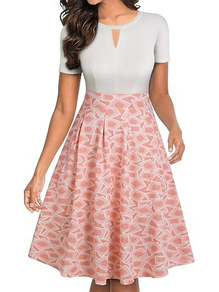 

2026 European-Style Women s Printed Round Neck Casual Short Sleeve Jumpsuit Skirt with Pockets XL
