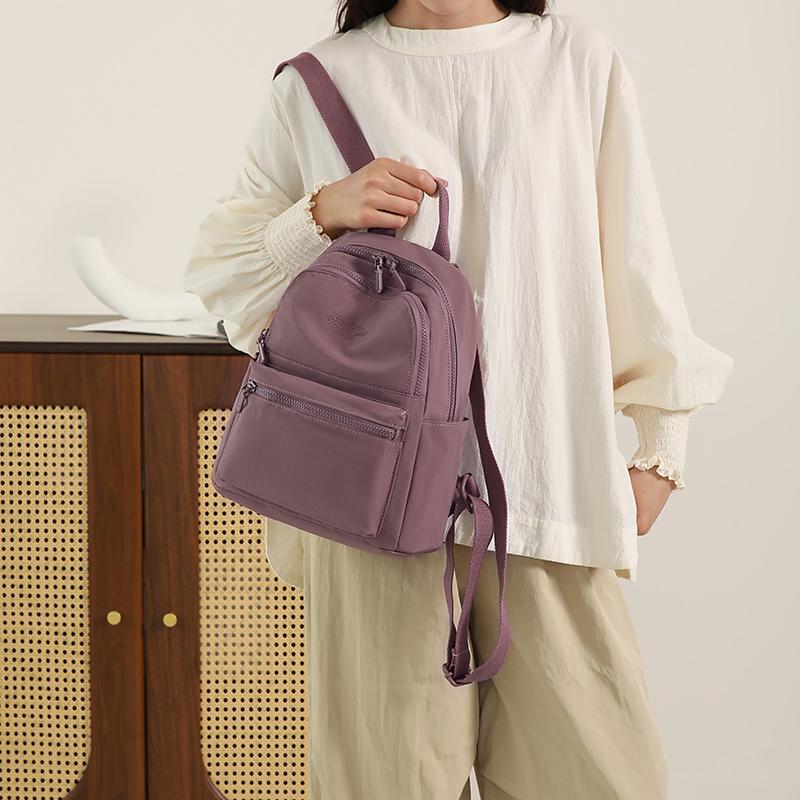 Compact Backpack with Front Zip Pocket Casual Shouler Bag for Daily Use