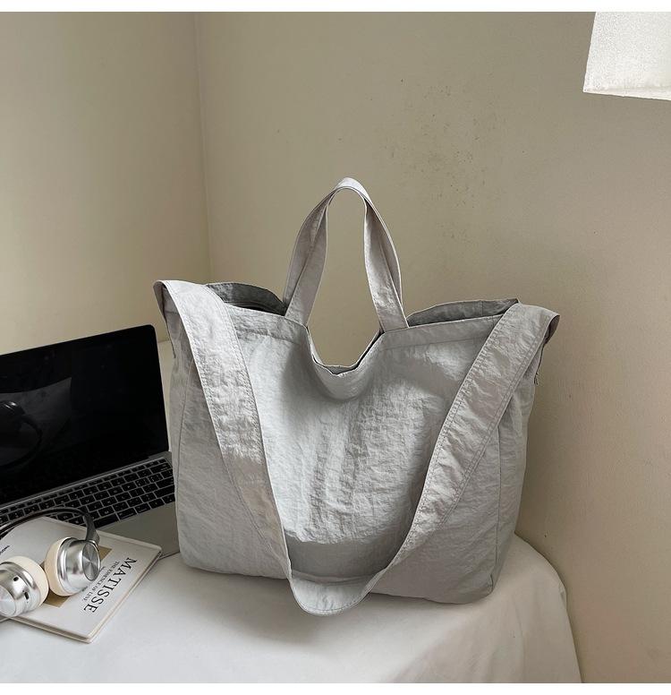 

Tote bag large capacity 2025 spring and summer new simple and lightweight hand pocket fashion shoulder bag crossbody canvas bag грязно-белый