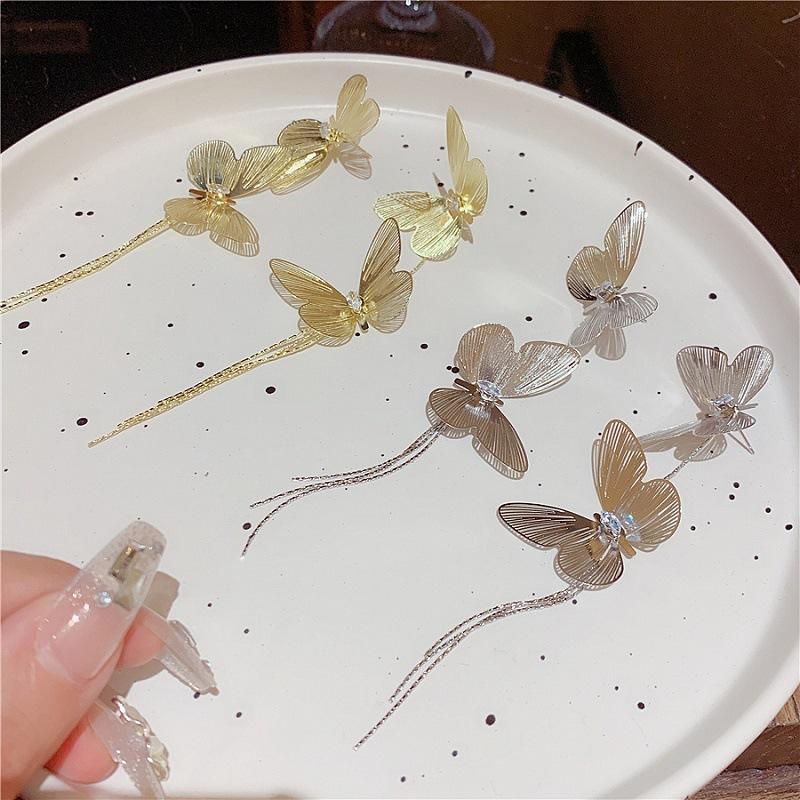 Three-dimensional metal line hollow zircon butterfly long fringed earrings women's 111 silver needle personalized fashion earrings women