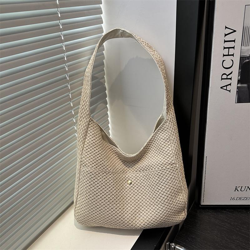 Summer travel seaside beach vacation 2025 straw commuting shoulder knitting large capacity tote bag premium sense