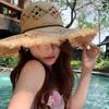 Elegant Raffia Sun Hat With Wide Brimmed And Breathable Openwork Design For Beach Vacation And Outdoor Activities