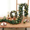 Encrypted Christmas Garland with Vine Lights and Decor