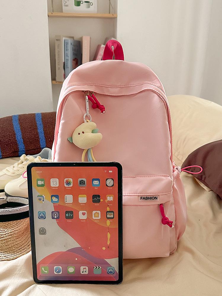 Zaino versatile in tinta unita: Leggero e Semplice per Studenti delle Scuole Medie e Superiori.