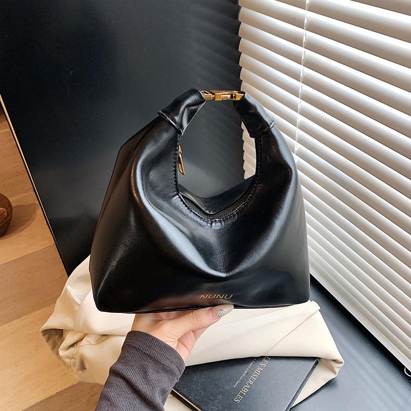 

2025 Retro Minimalist Women s Crossbody Dumpling Bag: Solid Color Autumn/Winter Handbag 22*9*22 чёрный