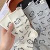 Trendy Korean Grey Mid-Calf Socks with English Letters & Cute Cat Label - Preppy Style