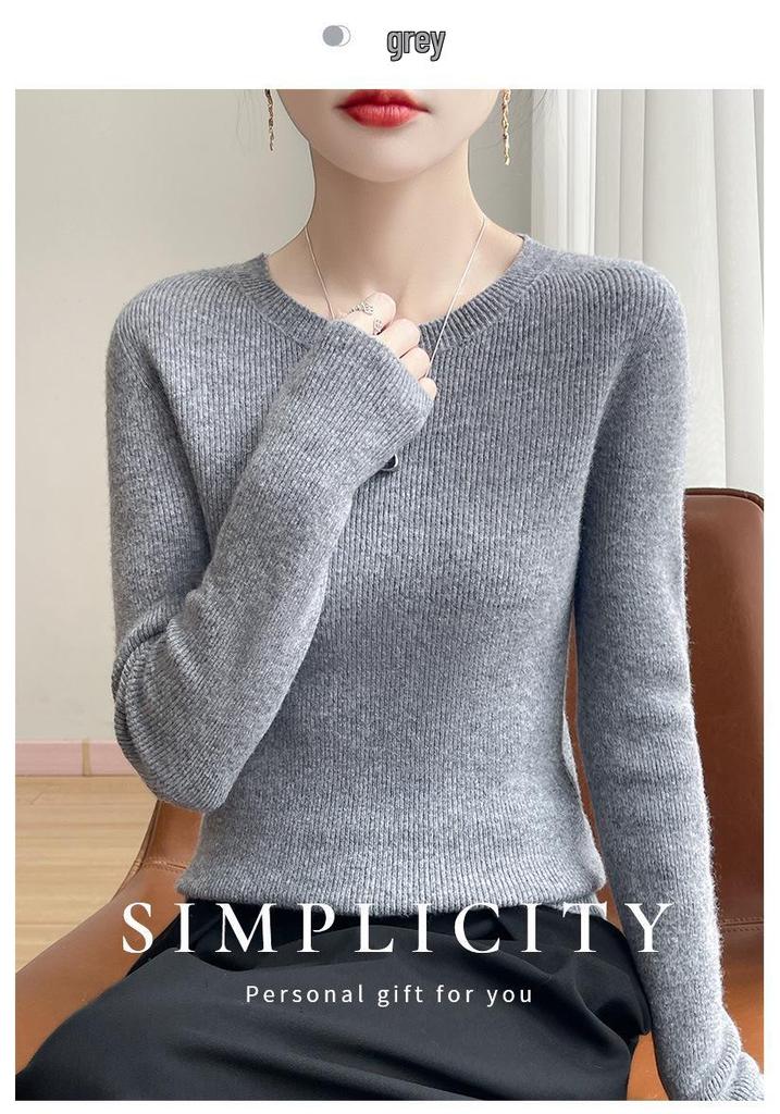 Round Neck Loose Fit Sweater with Seamless Knitting Technology - Comfortable and Slimming Design.