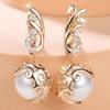 Japanese and Korean Style, High-end, Imitation Pearl Wing-pattern Earrings for Women Fashionable, Niche, and Elegant Party Accessories for a