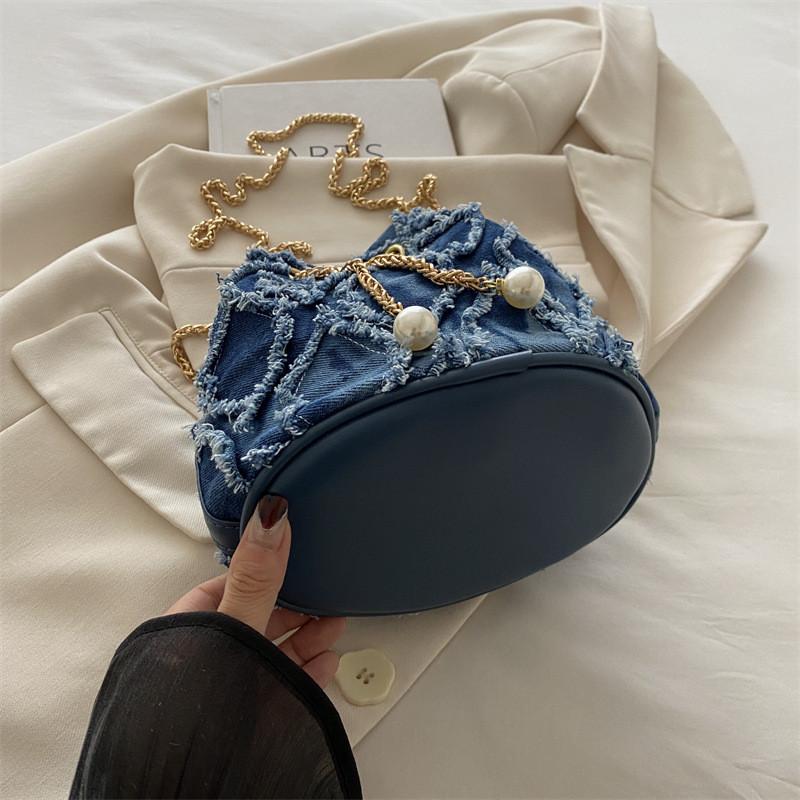 Borsa a tracolla in denim con catena e chiusura a coulisse per la moda quotidiana da donna