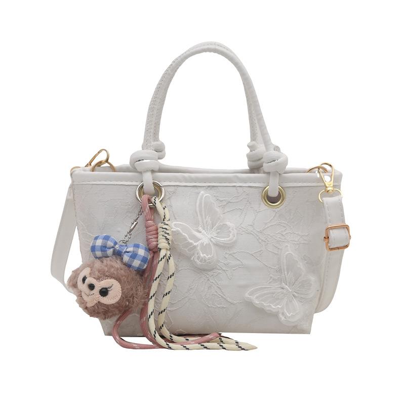 Super fire niche embroidered bag women's 2025 new summer versatile messenger bag fashionable portable bucket bag