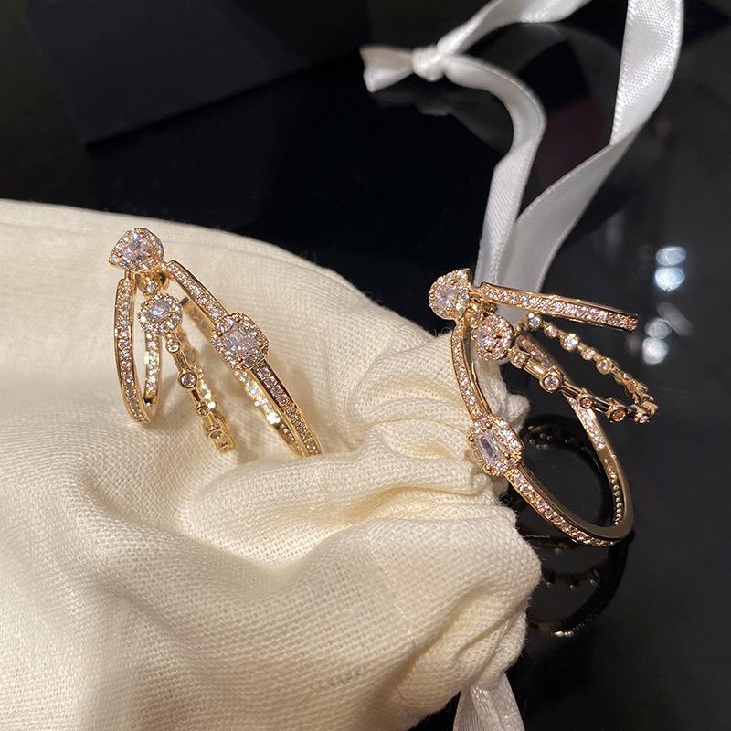 Silver needle zircon geometric oval hollow three-layer earrings French court style stud earrings light luxury earrings women
