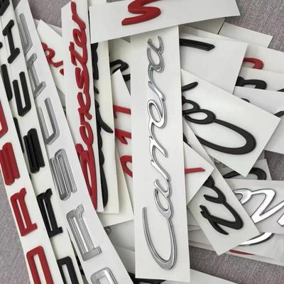 Neues Original-Logo-Abzeichen in glänzendem Schwarz, Rot und Silber