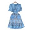 Leichter Luxus Promi-Stil High-End Kurzarmkleid Damen Sommer Hohlstickerei Design schick Nischen-Temperament Mittel- und Langkleid