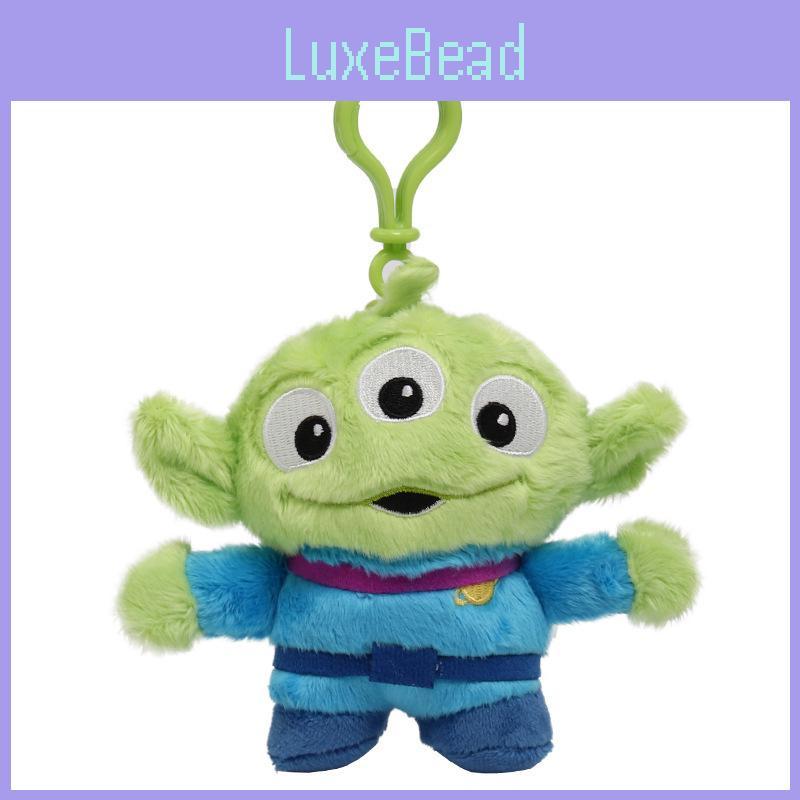 Kreslený design mimozemšťana a přívěsek jako doplněk pro děti