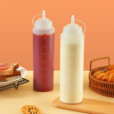 Bouteille à sauce en plastique à bec pointu de 500 ml, fabriquée avec des matériaux respectueux de l'environnement, propre et anti-poussière.