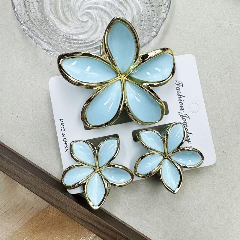 Set di pinze per capelli a forma di frangipani: Accessori per Capelli Floreali in Finto Marmo per Vacanze alla Moda