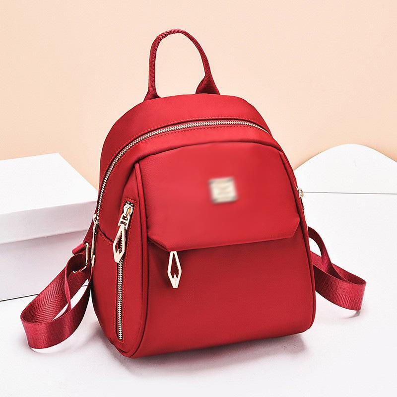 Backpack women s new middle-aged women s soft leather travel small backpack dual-purpose Oxford cloth school bag shoulder bag bags красный