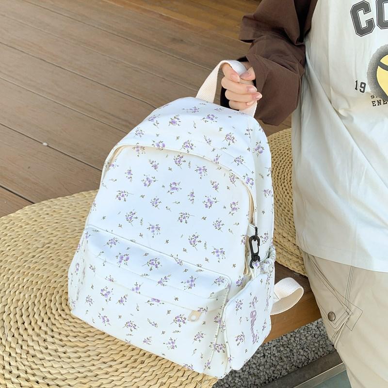 School bag 2025 fresh and cute floral school bag is simple and light for junior high school students, versatile for commuting and large capacity